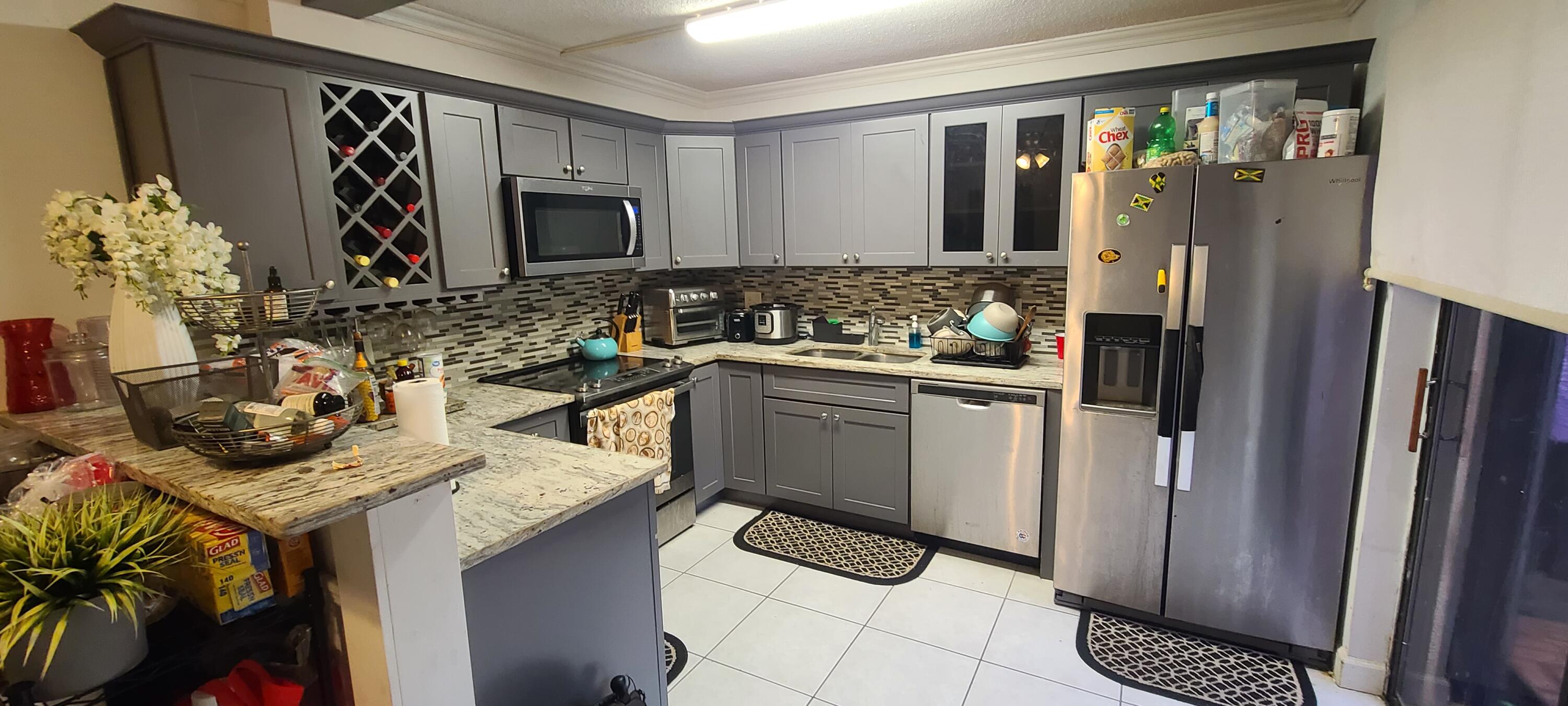 Well Maintained and nicely updated 2 Bedroom 2 Bath townhouse with Courtyard entry! Two large bedrooms and 2 Full baths. Decorative faux fireplace in the Living Room. Upgraded Granite counters in the eat-in kitchen, and decorative backsplash. Fantastic location and low monthly HOA! Move in ready!