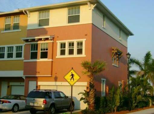 HUGE 4 BR, 3.5 BA townhouse w/ 2 car garage. Wood flooring throughout. Rent includes basic cable, internet, water, impact windows, manned gate. Washer/dryer, resort-style pool, clubhouse, fitness room. Close to everything, shopping, dining, downtown, airport, nightlife, etc. Pets ok with deposit. Property professionally managed. Tenant must carry renters & liability insurance. Credit check req'd (broker may provide, no free reports) App fees $100 to CitySide (per adult, married counts as one). NOTE: CITYSIDE HOA application is done online - citysideonline First & TWO MONTHS security required. Per HOA rules no more than 4 unrelated persons allowed in unit.