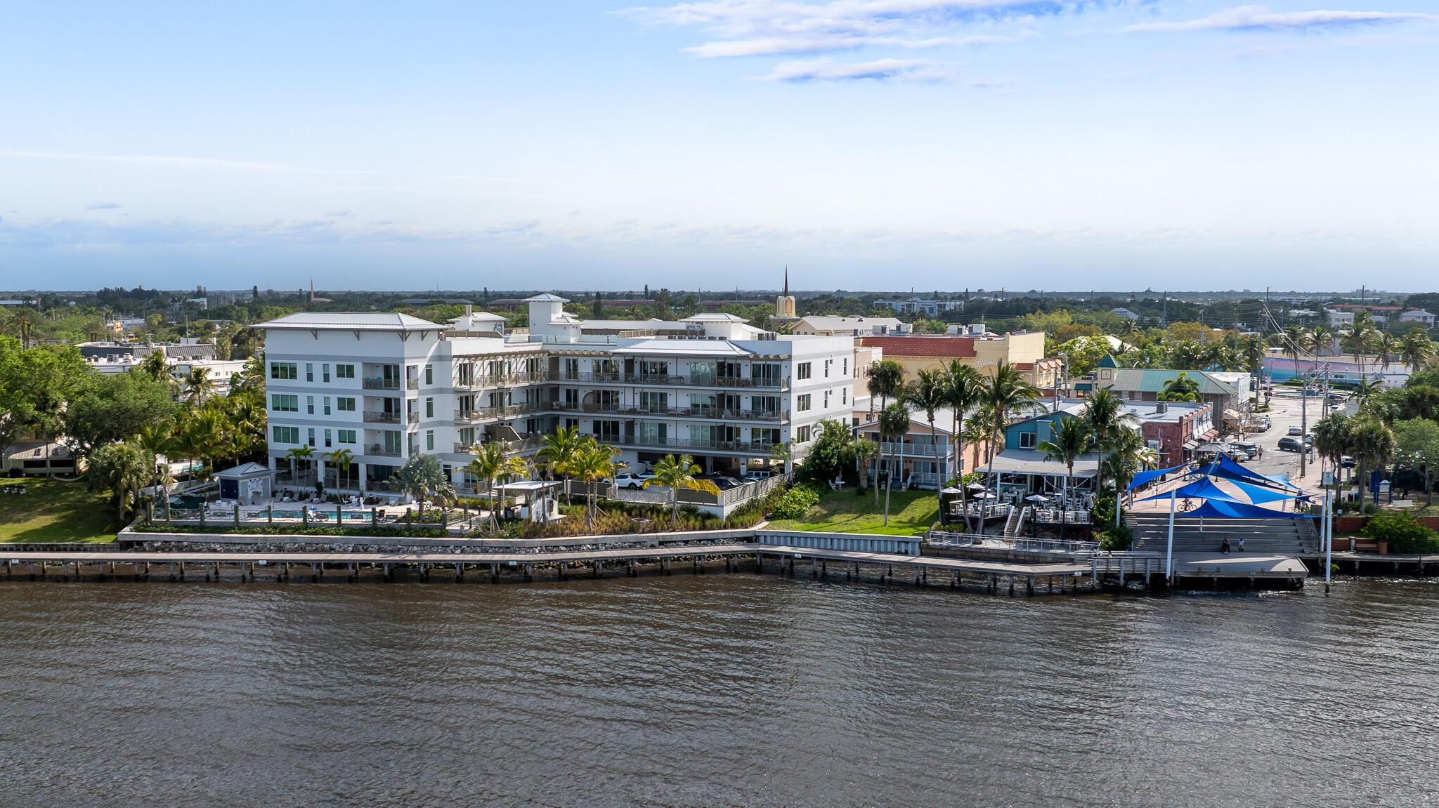 Experience luxury living in this elegantly furnished, newly built (2023) condo at Sailfish Cove, ideally located in vibrant Downtown Stuart. This exquisite 2-bedroom, 2-bathroom unit with a den features a thoughtfully designed layout, modern finishes, and an oversized balcony to enjoy the coastal breeze. The bright interior is filled with natural light, creating a warm and welcoming ambiance. Residents can enjoy resort-style amenities, including a waterfront pool, jacuzzi, and a fully equipped outdoor kitchen, perfect for entertaining. Just steps away from dining, shopping, and entertainment, this condo seamlessly combines elegance, convenience, and coastal charm. Seasonal options and rates are available. Don't miss the opportunity to live in the sought-after Sailfish Cove community!