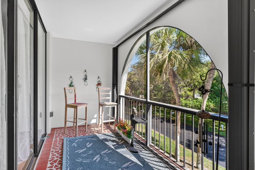Lives like a house! 3BR/3BA 2400sqft condominium. Glass sliders open the entire property to beautiful treetop views. Screened balconies extend 2 lengths of this 2nd floor corner unit. Enjoy Ocean breezes from East 27' balcony. Extensively renovated floor to ceiling by seller since 2021: New floors, kitchen, appliances ('24), 3 baths. So much storage! 3 huge walk in closets. New AC 12/2025. Accordion shutters. Secure bldg. 2 garage parking spaces + storage. Clubhouse, pool, tennis, pickleball & nature trail. Idyllic parklike setting! All assessments paid! Sizes are approximate and subject to change.