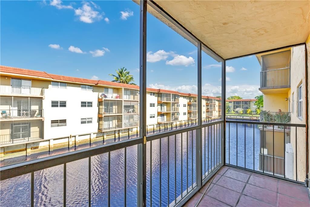 Great 2 bedroom 2 bathroom condo at Hidden Harbor that has been updated and beautifully maintained. This property features wood floors, updated kitchen with granite countertops, beautiful wood cabinets, stainless steel appliance, hurricane impact glass windows and all major components are newer. AC is 2018, water heater is 2017, all impact windows and sliders 2019. Complex features a gated entrance for enhanced security, great views of the river, delightful pool area, workout room, great central location.