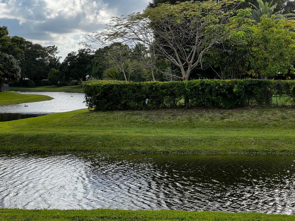 Photo of 10821 N Military Trail #13, Palm Beach Gardens, FL 33410 (MLS # R10997758)