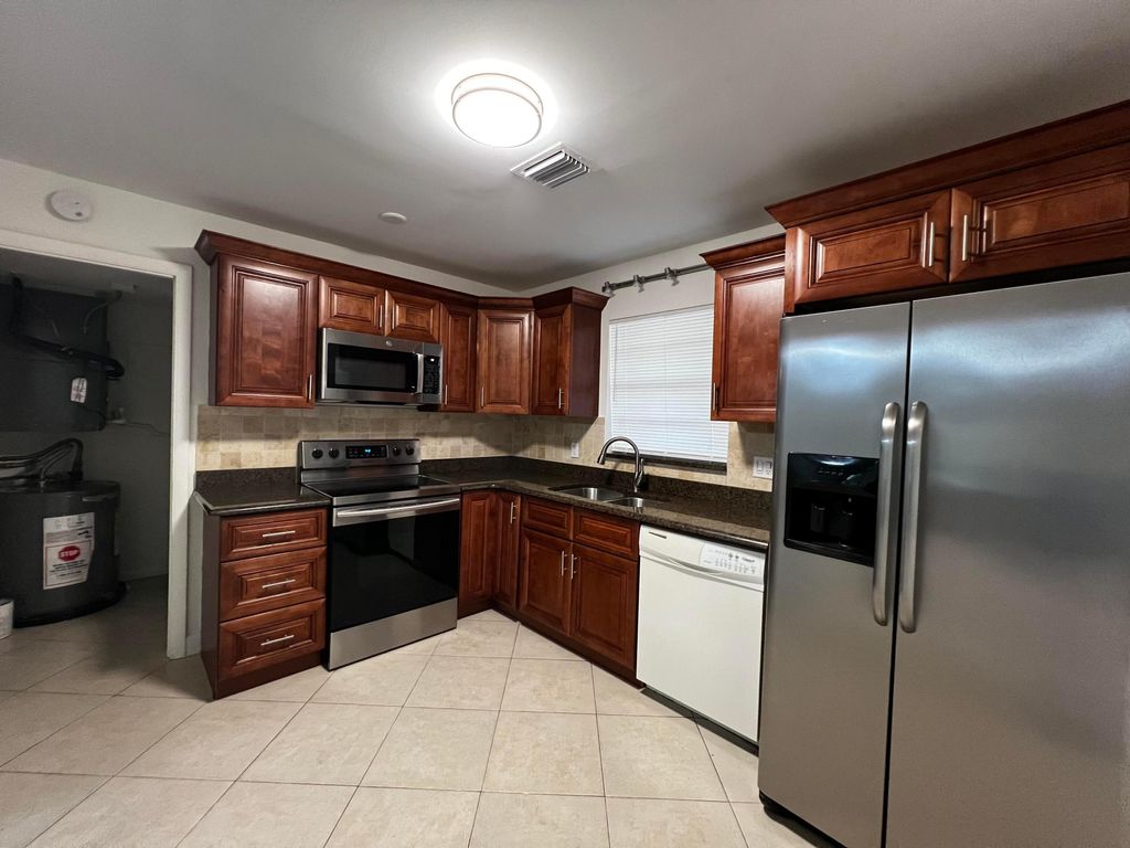 Photo of 10821 N Military Trail #13, Palm Beach Gardens, FL 33410 (MLS # R10997758)