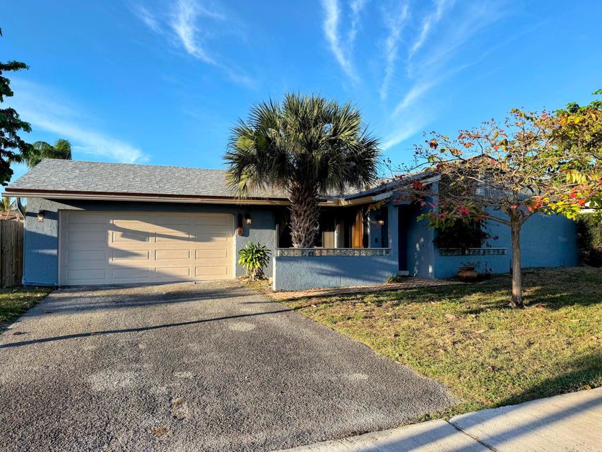 Rarely available 4-bedroom, 2-bath home in the desirable non-HOA community of Coral Gate! This well-maintained property features a brand new shingle roof (2025) and freshly painted exterior (2025) for excellent curb appeal. Inside offers a custom eat-in kitchen with hardwood cabinetry and granite countertops, vaulted ceilings in the main living area, and custom built-in cabinetry. Additional upgrades include a newer A/C (2020), full hurricane shutter protection throughout, and a brand new 200-amp electrical panel. A great opportunity in a highly sought-after neighborhood—schedule your showing today!