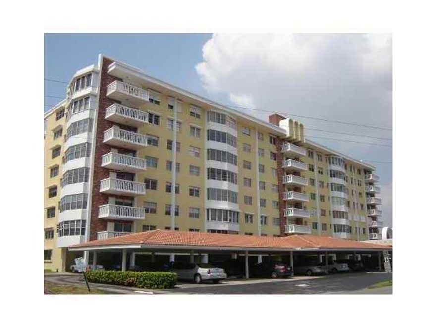 Light & bright, spacious corner unit with fantastic views overlooking the golf course & lake. Blank canvas, ready for your personal touches. Being sold AS-IS. Doorman. Covered parking. Pool next to 5th hole on golf course at Coral Ridge Country Club. Great neighborhood in a great location, close to dining, shopping & much more. Only 1.5 miles to the beach & popular Commercial Boulevard Anglin's Fishing Pier. Don’t miss this opportunity to own in desirable Country Club Towers.