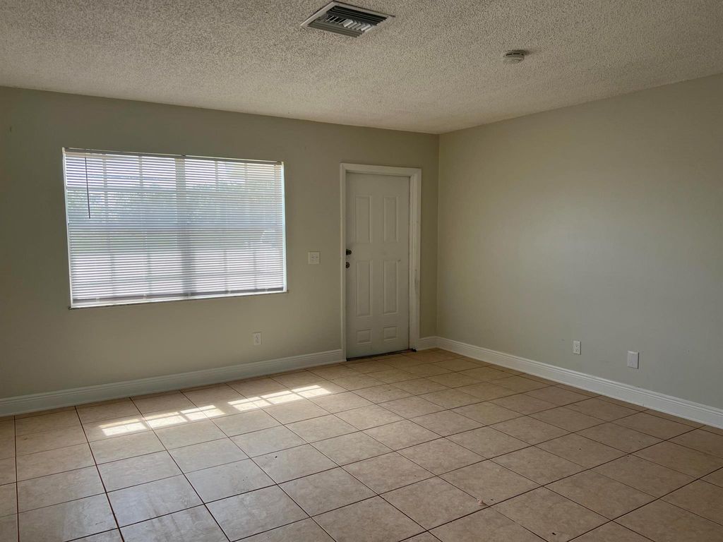 Photo of 2647 Cherokee Avenue, Fort Pierce, FL 34946 (MLS # R10998641)