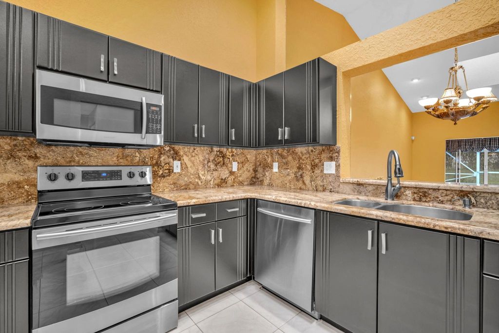 Photo of 7280 Summer Tree Dr #B, Boynton Beach, FL 33437 (MLS # F10496261)