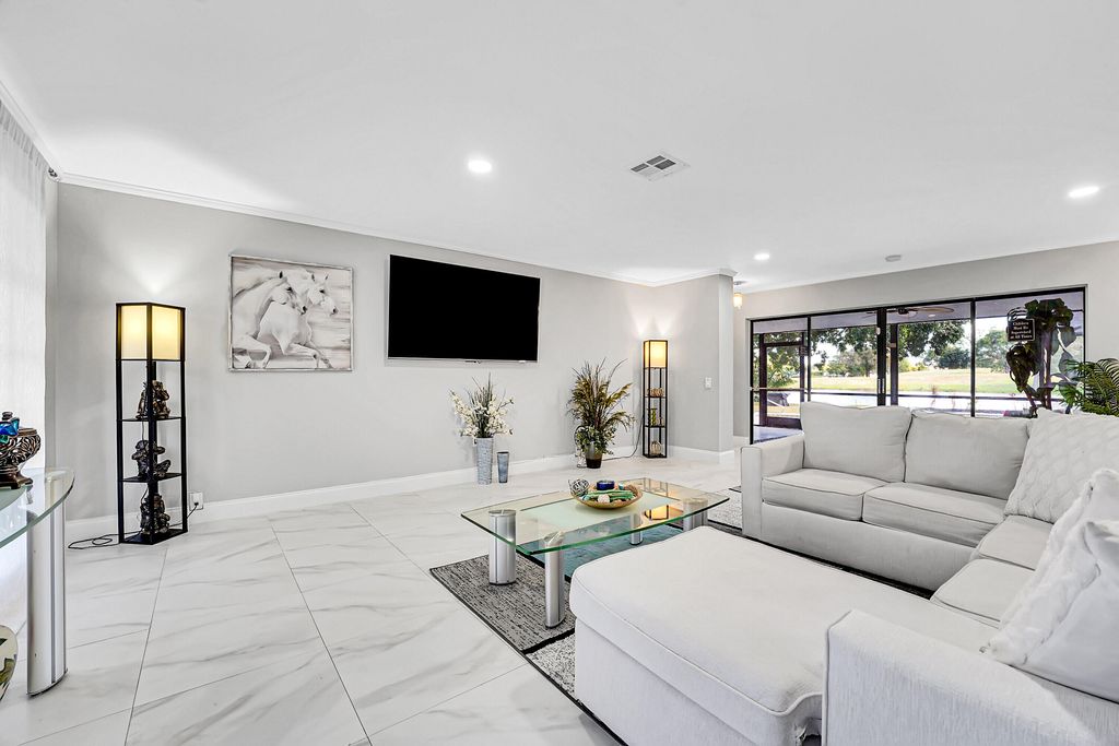 Photo of 1618 The 12th Fairway, Wellington, FL 33414 (MLS # B26001923)