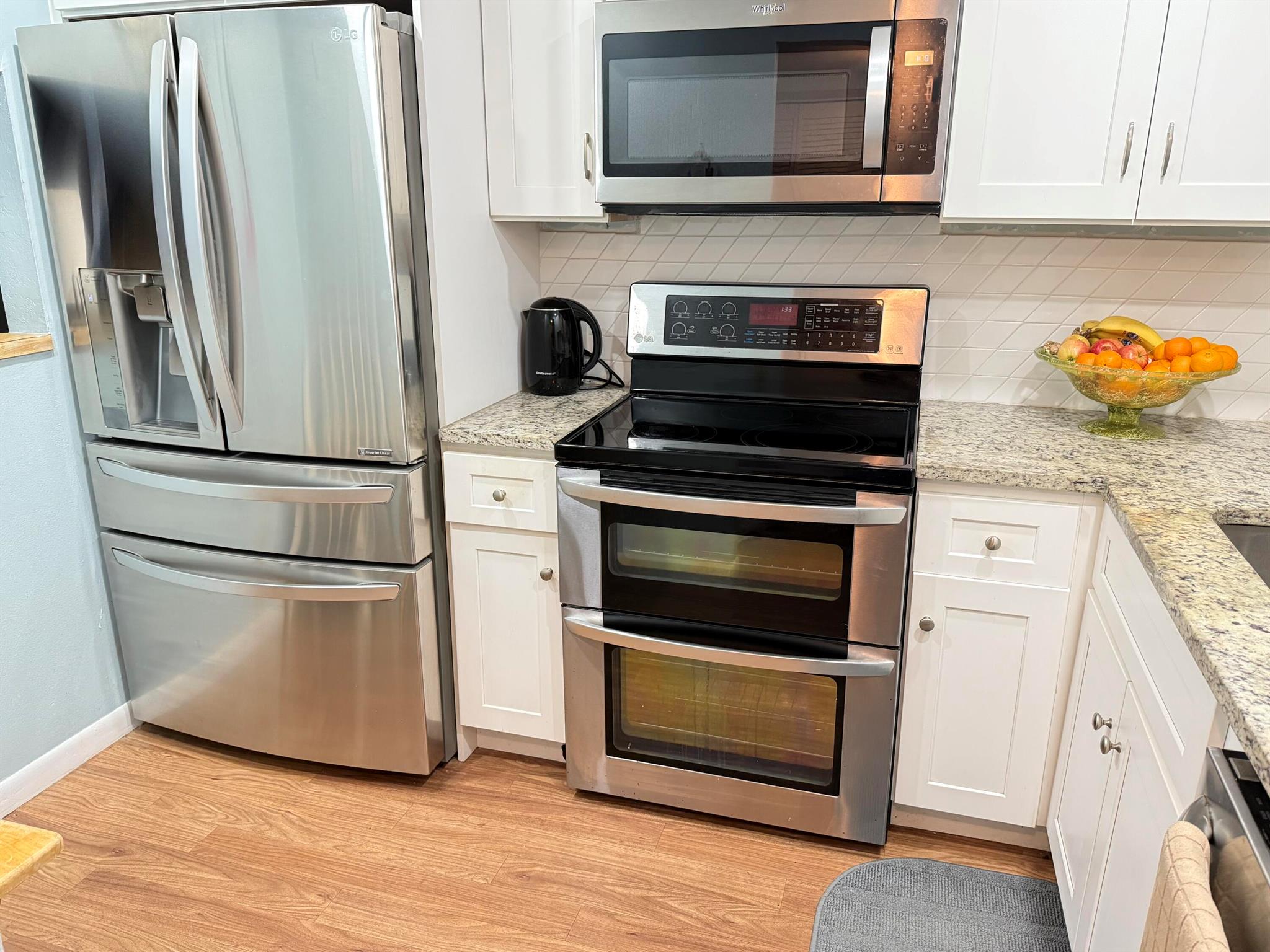 Updated 2BR/2BA CORNER UNIT WITH WATER VIEW-NO CARPET.Bright and spacious 2nd floor corner condo with serene water views. This 2- bedroom, 2 bath unit features a remodeled kitchen, vinyl floors throughout- no carpet and a screen balcony to enjoy the view.Located in a well maintained community offering resort style amenities including indoor pool, jacuzzi ,clubhouse, tennis and a golf course. Perfect for year-round living or seasonal use. Conveniently located near shopping dining and major roadways. Call today for viewing.