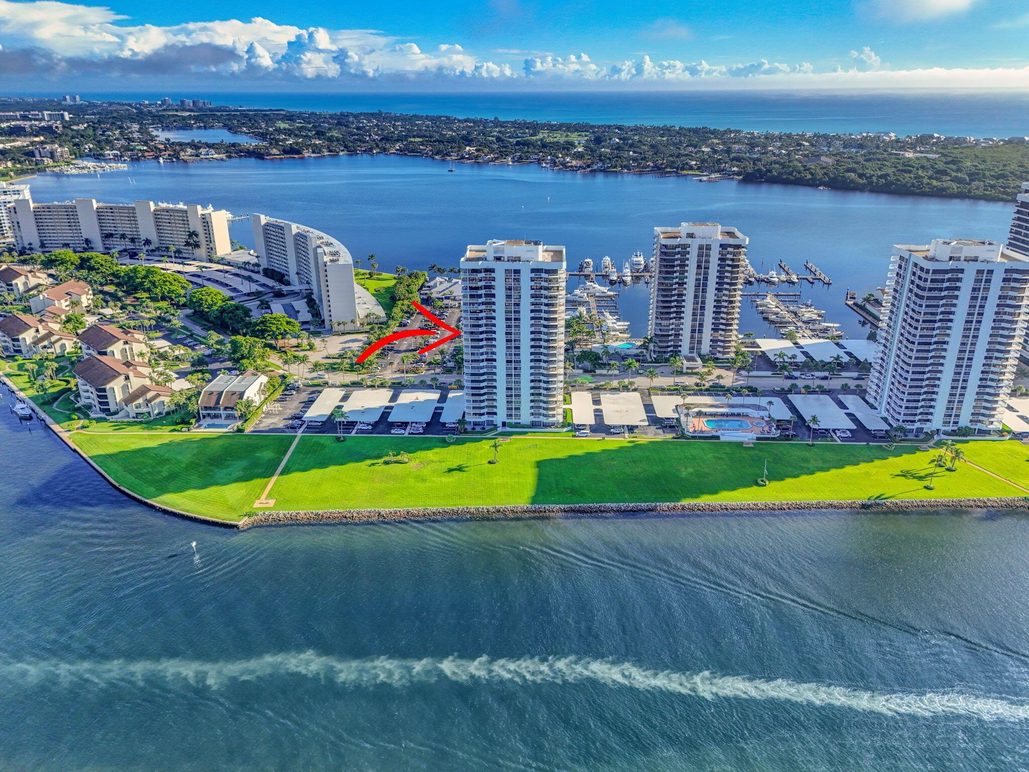 Breathtaking corner residence with 2,500+ sq. ft. and sweeping Intracoastal and Ocean views from every room. This 3BR home has been completely reimagined with elegant porcelain tile, and a showpiece chef's kitchen featuring quartz countertops, custom cabinetry, and Sub-Zero, Wolf & Miele appliances. Designer bathrooms showcase stunning tile and premium fixtures. Enjoy peace of mind with newer AC, hurricane impact glass, new accordion shutters and all new electrical. Located in the prestigious, gated Old Port Cove community in North Palm Beach, residents enjoy a resort lifestyle with a renowned marina, two-mile waterfront walking path, 24-hr security, and on site restaurant, pool, spa and his and her sauna!
