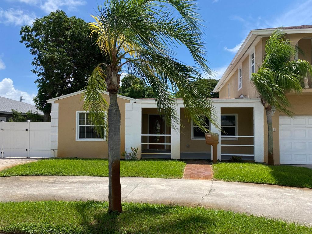 Photo of 330 Cypress Drive #B, Lake Park, FL 33403 (MLS # R11017601)