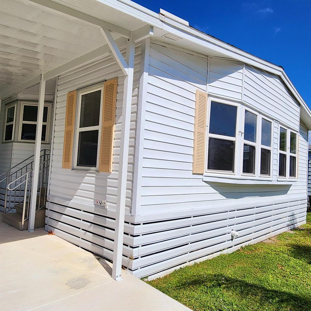 Photo of 184 W Caribbean, Port Saint Lucie, FL 34952 (MLS # R11032524)