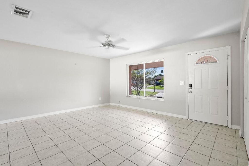 Photo of 1449 SE Minorca Avenue, Port Saint Lucie, FL 34952 (MLS # R11132546)