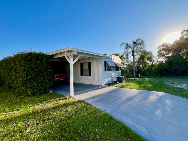 Photo of 23 San Pablo Lane, Port Saint Lucie, FL 34952 (MLS # R11069399)