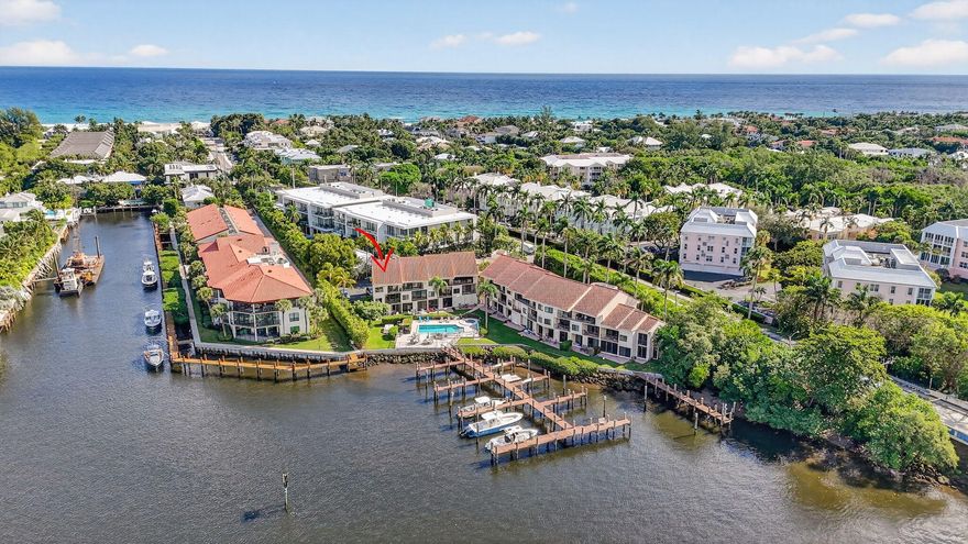 Discover the best of coastal living in this 2BR/2.5BA townhome on Delray's coveted barrier island—just a short walk to the beach. Perfectly positioned directly on the Intracoastal, this residence includes a  private boat slip accommodating up to a 30' vessel, offering unparalleled access to the water. Inside, enjoy a bright, open layout with generous living spaces and water views, ready for your personal touches and customization. An exceptional opportunity to create your dream retreat steps from the ocean and minutes to vibrant Atlantic Avenue. Coastal convenience, boating lifestyle, and prime location all in one.