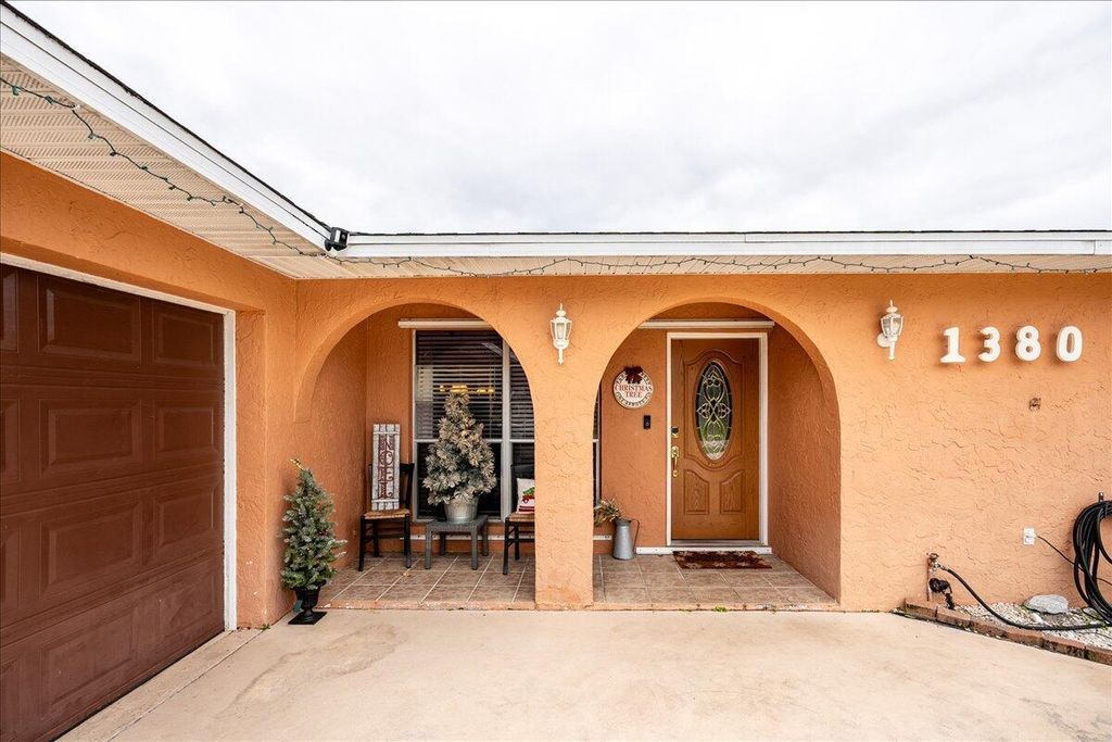 Photo of 1380 SE Navajo Lane E, Port Saint Lucie, FL 34983 (MLS # R10944926)