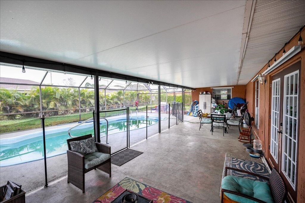 Photo of 1380 SE Navajo Lane E, Port Saint Lucie, FL 34983 (MLS # R10944926)