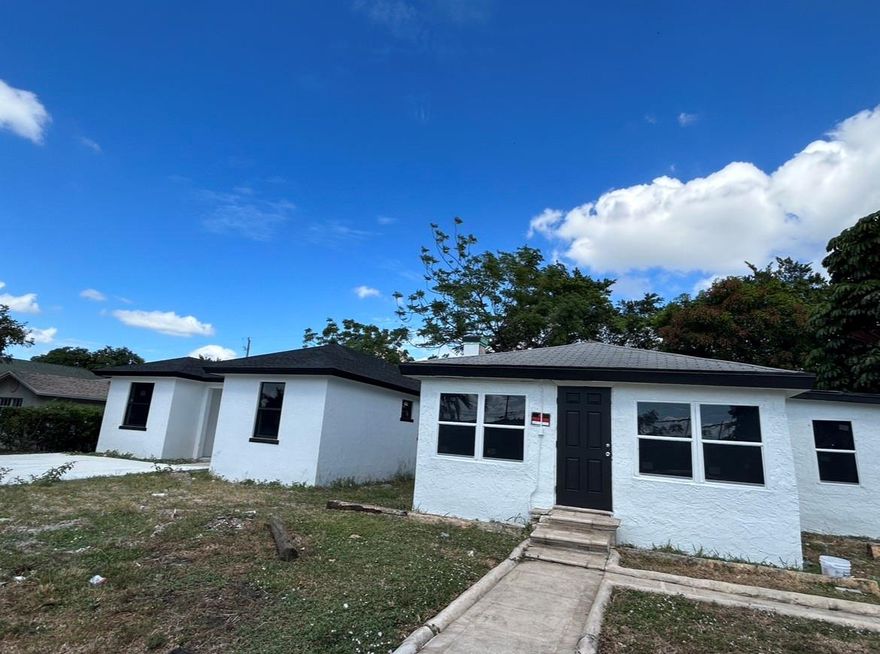 4 bed home with large backyard. Vinyl Floors. New windows being done with permits.