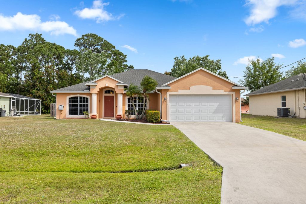 Photo of 5937 NW Brenda Circle, Port Saint Lucie, FL 34986 (MLS # R10975370)