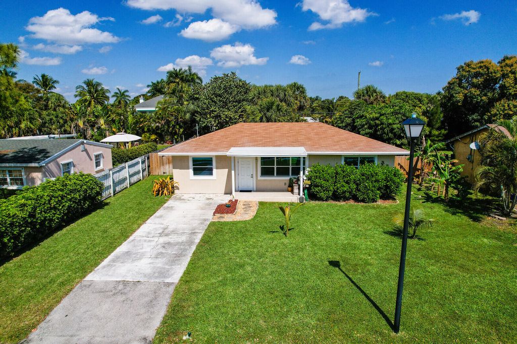 Photo of 2559 Conroy Drive, North Palm Beach, FL 33403 (MLS # R10780510)