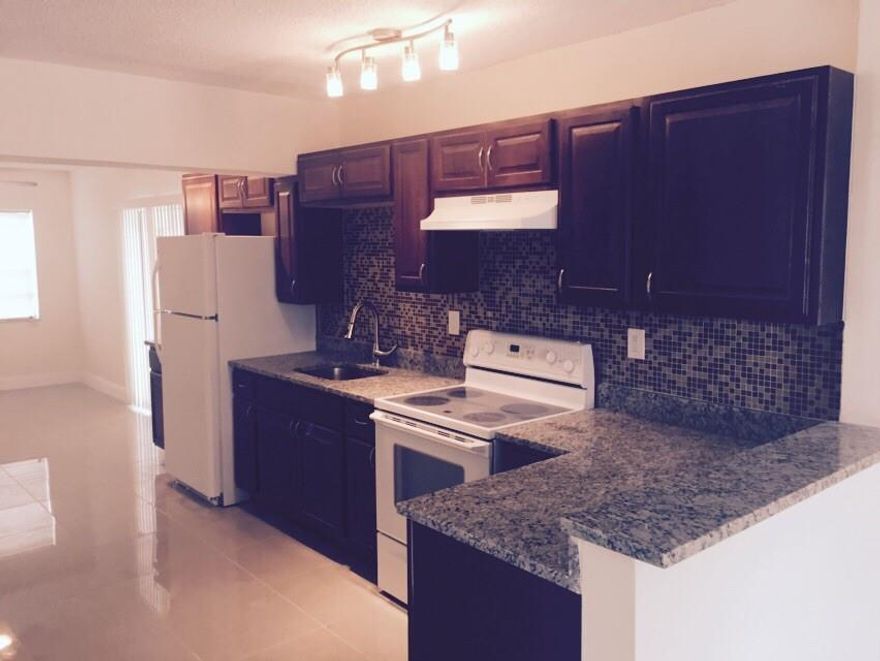 RENOVATED 4X2, BEAUTIFUL OPEN LAYOUT, CENTRAL AC, GRANITE COUNTERTOPS, LOTS OF WINDOWS FOR NATURAL LIGHT, LARGE BACKYARD WITH ROOM FOR POOL, CLOSE TO SHOPPING CENTER AND THE BEACH.
