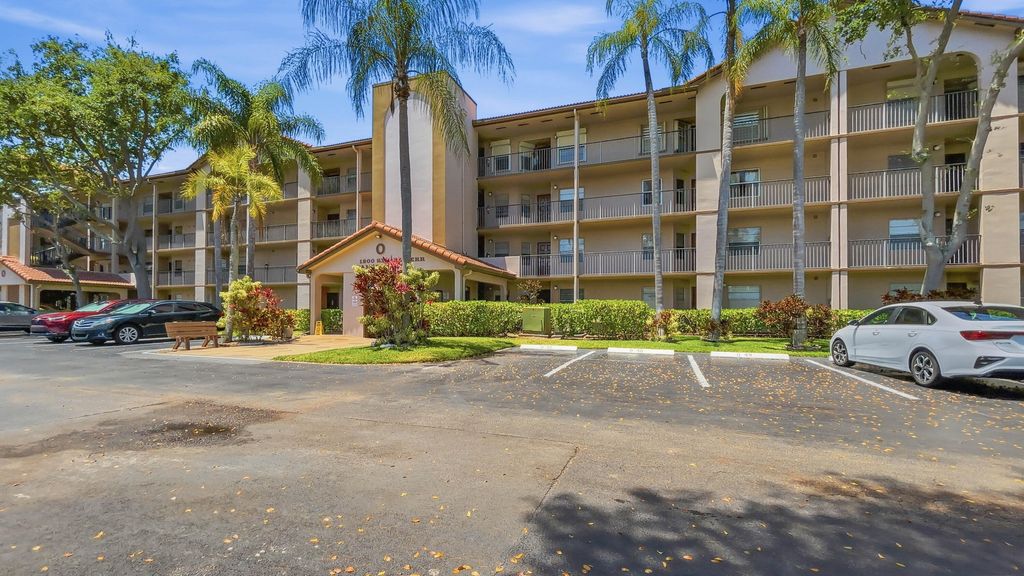Photo of 1200 SW 124th Terrace #208o, Pembroke Pines, FL 33027 (MLS # B26027456)
