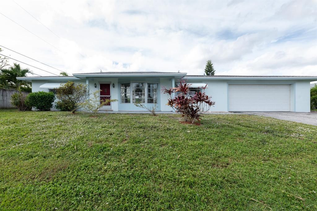 Photo of 9697 Dahlia Avenue, Palm Beach Gardens, FL 33410 (MLS # R10759981)
