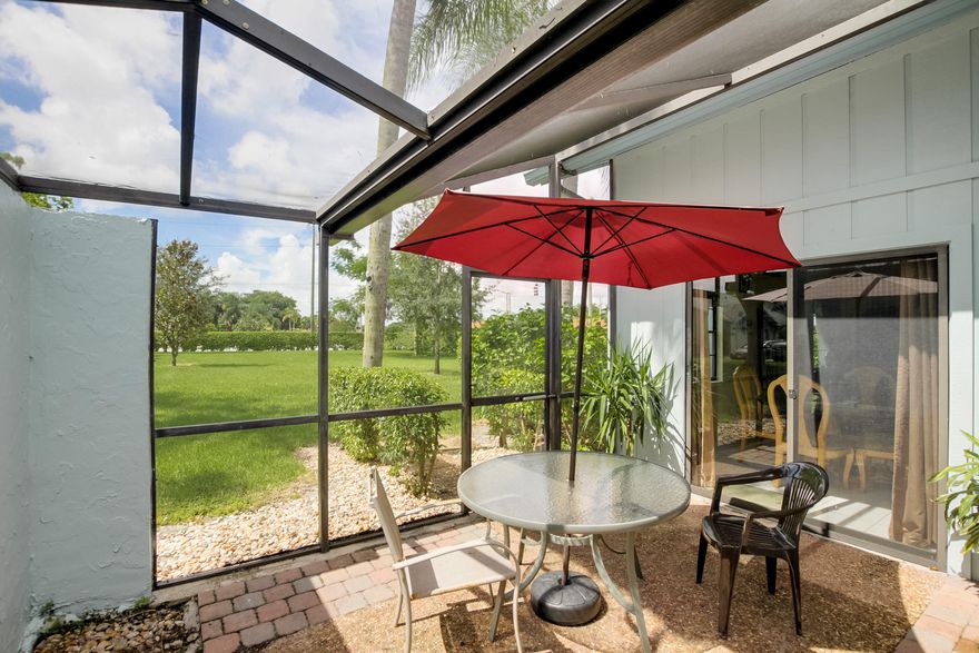 Minutes from I-95 & Turnpike this Central Boca Villa offers 3 bedrooms, 2 bathrooms and a 2 car garage. The living room area features plenty of natural light which is a product of extra windows as being an end unit. The galley style kitchen is equipped with a stainless steel refrigerator, plenty of cabinet space and a conveniently placed breakfast nook.  This oversized master bedroom and bathroom is perfect for those searching for a master suite space. The remaining 2 bedrooms are perfect for those seeking large than average spaces. This villa has tile throughout including the 2 car garage that features plenty of storage space. A screened in patio opens to a massive green space giving this villa the feel and privacy you deserve. ADDITIONAL PHOTOS & FULL VIDEO COMING SOON!!!