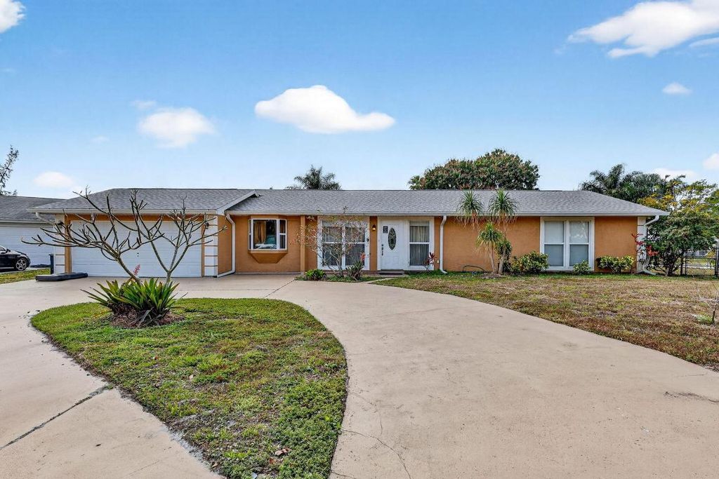 Photo of 331 NE Camelot Drive, Port Saint Lucie, FL 34983 (MLS # R11158520)