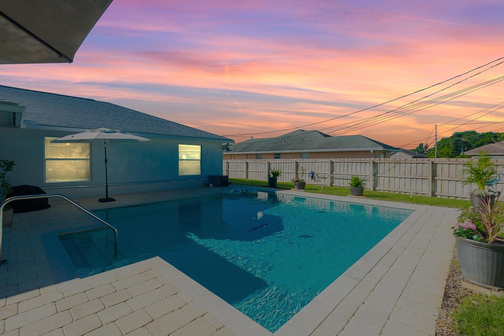 Photo of 413 SW Mccomb Avenue, Port Saint Lucie, FL 34953 (MLS # R11164273)