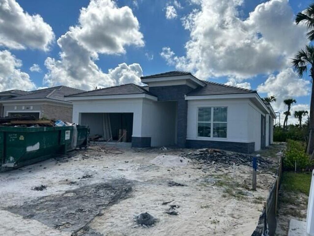 Photo of 10171 Driftwood Way, Palm Beach Gardens, FL 33412 (MLS # R10918382)