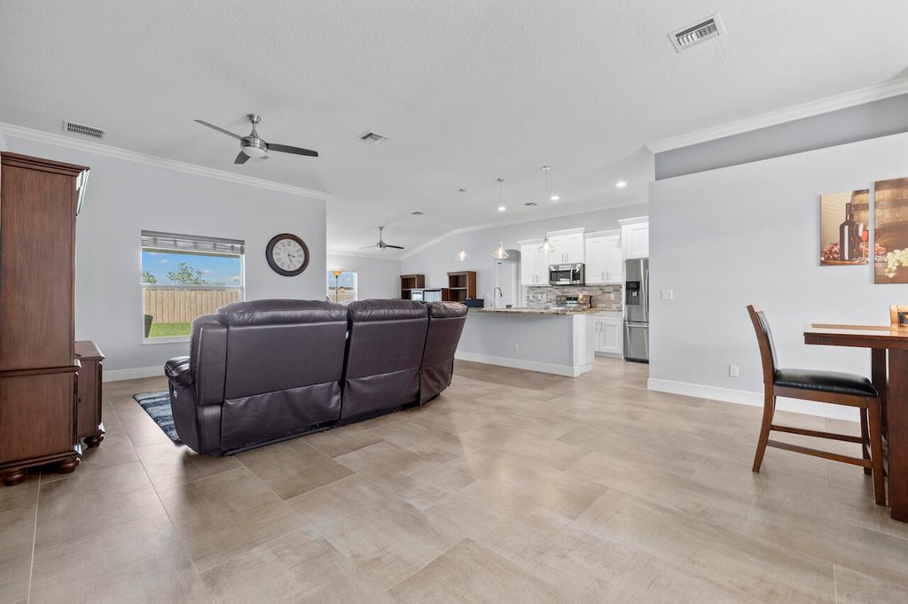 Photo of 5957 NW Brenda Circle, Port Saint Lucie, FL 34986 (MLS # B26013704)