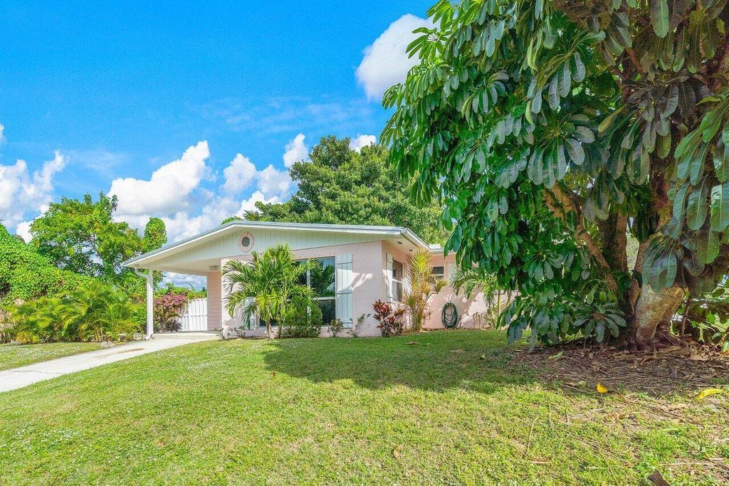 Photo of 2057 NE Ridge Avenue, Jensen Beach, FL 34957 (MLS # R10943210)