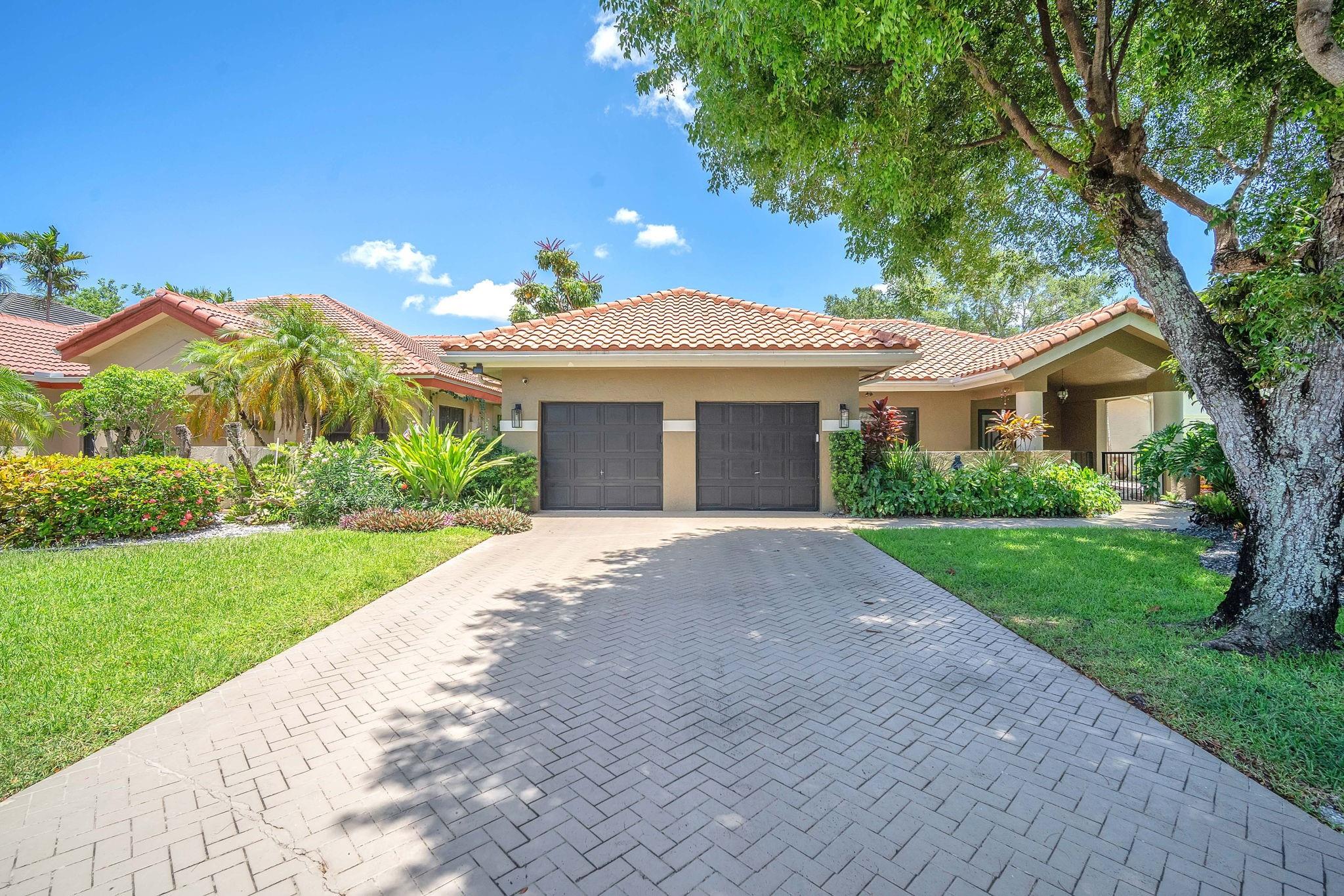 Welcome to a charming sanctuary located in the gated community at Jacaranda Cove in the heart of Plantation. This home is ideal for those seeking a serene yet functional living environment. Almost everything in this spacious SFH has been exquisitely renovated within the past 4 yrs including bathrooms, flooring, appliances, & windows & doors. The home features 3bedrooms & 2.5baths with living areas that are perfect for both entertaining guests & enjoying quiet family moments. The kitchen features a thoughtfully designed pantry with custom cabinetry. Venture outdoors to discover a private oasis that includes a refreshing pool, perfect for enjoying sunny Florida days & front terrace for the warm evenings. Experience the perfect blend of luxury, comfort, and security.