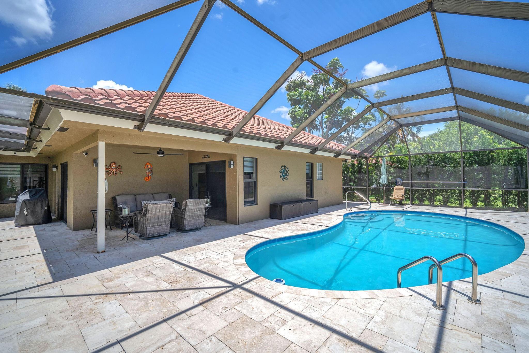 Welcome to a charming sanctuary located in the gated community at Jacaranda Cove in the heart of Plantation. This home is ideal for those seeking a serene yet functional living environment. Almost everything in this spacious SFH has been exquisitely renovated within the past 4 yrs including bathrooms, flooring, appliances, & windows & doors. The home features 3bedrooms & 2.5baths with living areas that are perfect for both entertaining guests & enjoying quiet family moments. The kitchen features a thoughtfully designed pantry with custom cabinetry. Venture outdoors to discover a private oasis that includes a refreshing pool, perfect for enjoying sunny Florida days & front terrace for the warm evenings. Experience the perfect blend of luxury, comfort, and security.