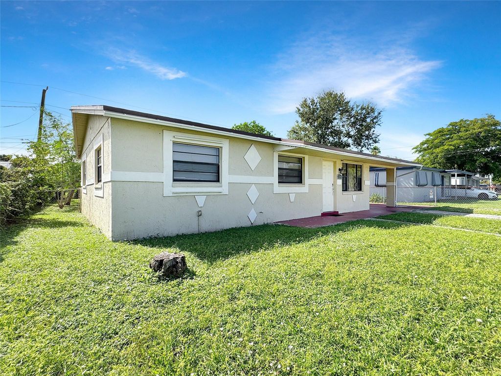 Photo of 3282 NW 13th St, Lauderhill, FL 33311 (MLS # F10533927)