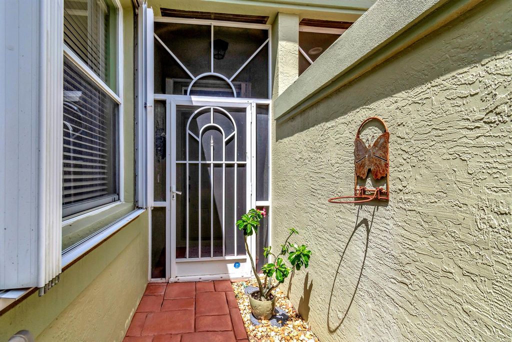 Photo of 5973 Cocowood Court, Boynton Beach, FL 33437 (MLS # R10943822)