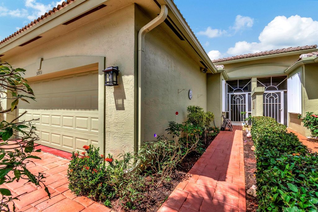 Photo of 5973 Cocowood Court, Boynton Beach, FL 33437 (MLS # R10943822)