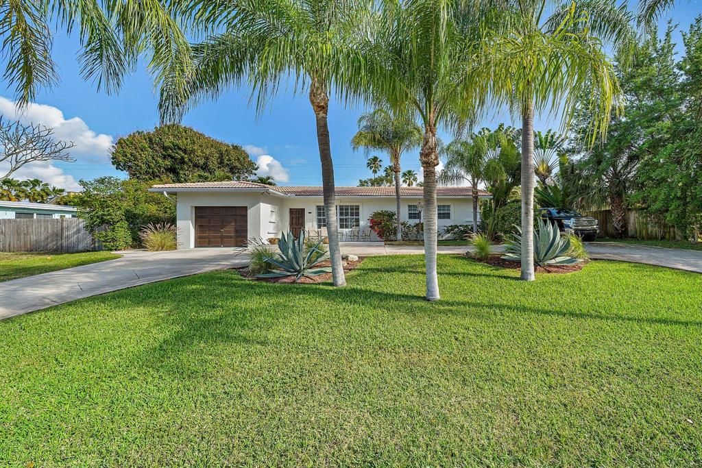 Photo of 2031 Pleasant Drive, North Palm Beach, FL 33408 (MLS # R10702158)