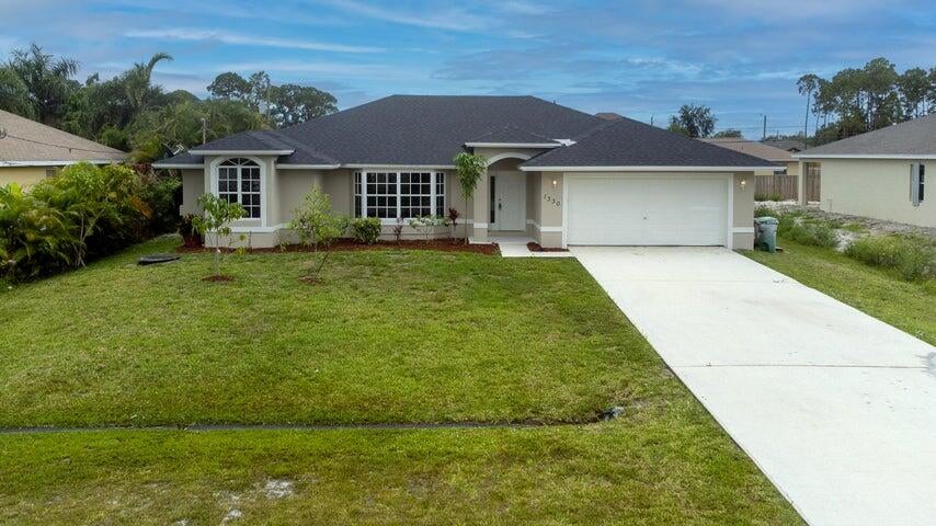 Photo of 1330 SW Del Rio Boulevard, Port Saint Lucie, FL 34953 (MLS # R10967686)