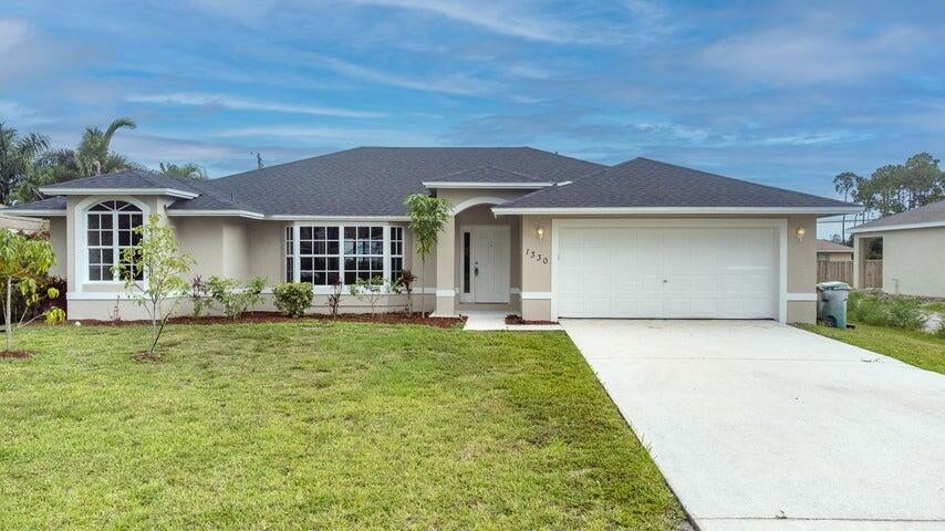 Photo of 1330 SW Del Rio Boulevard, Port Saint Lucie, FL 34953 (MLS # R10967686)
