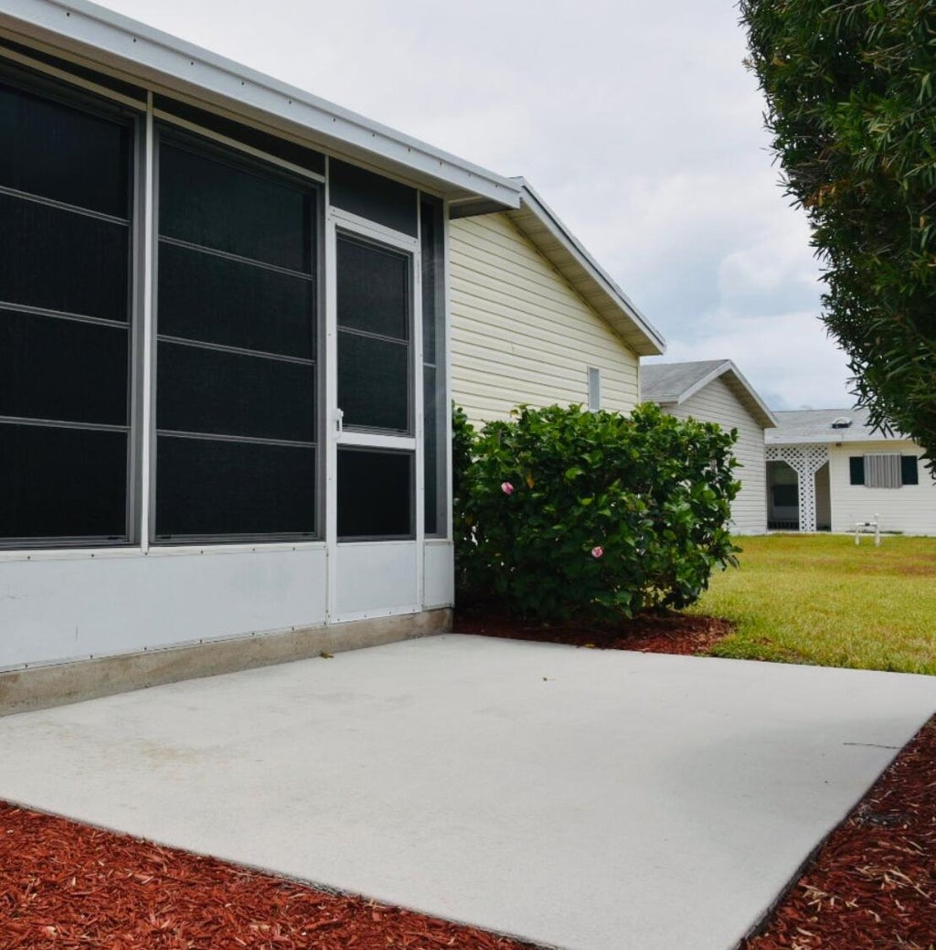 Photo of 3801 Spatterdock Lane, Port Saint Lucie, FL 34952 (MLS # B26025528)
