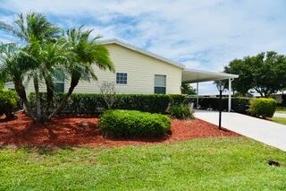 Photo of 3801 Spatterdock Lane, Port Saint Lucie, FL 34952 (MLS # B26025528)