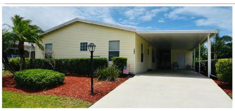 Photo of 3801 Spatterdock Lane, Port Saint Lucie, FL 34952 (MLS # B26025528)