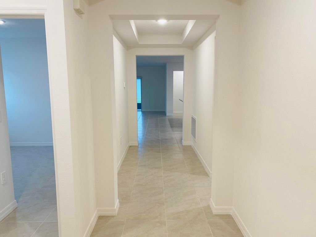 Photo of 6127 NW Drophy Avenue, Port Saint Lucie, FL 34986 (MLS # R10923581)