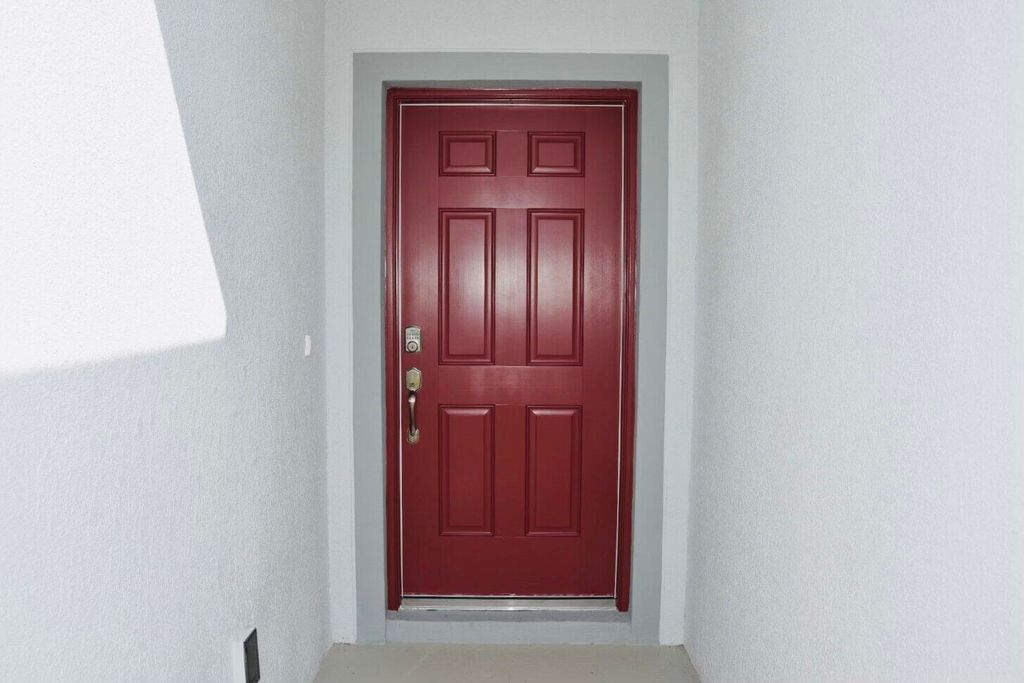 Photo of 6127 NW Drophy Avenue, Port Saint Lucie, FL 34986 (MLS # R10923581)