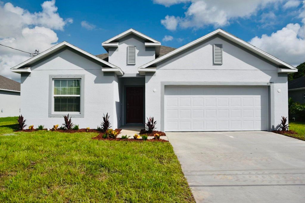 Photo of 6127 NW Drophy Avenue, Port Saint Lucie, FL 34986 (MLS # R10923581)