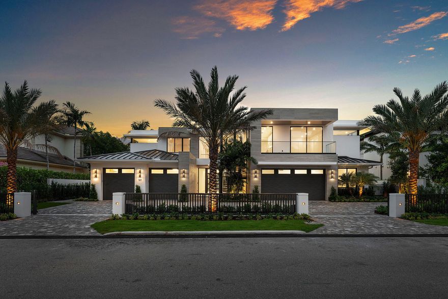 Experience unparalleled luxury in this brand-new waterfront estate in the prestigious Royal Palm Yacht & Country Club. Designed by The Benedict Bullock Group and masterfully built by Hanna Homes, this residence offers over 10,000 square feet of exquisitely crafted living space, seamlessly blending modern sophistication with timeless elegance. A grand entryway leads to expansive living areas, where walls of glass frame breathtaking water views. The gourmet kitchen, complemented by an attached service kitchen, is a chef's dream, outfitted with top-tier appliances and custom finishes. A sophisticated club room with a full bar, a spacious office, and a state-of-the-art gym elevate the home's lifestyle appeal.
