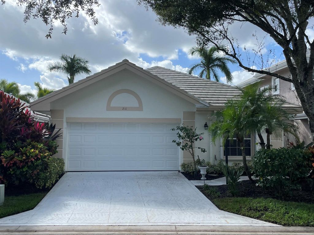 Photo of 210 Canterbury Drive W, Palm Beach Gardens, FL 33418 (MLS # R10887056)