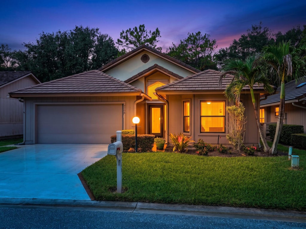 Photo of 4208 SW Mallard Creek Trail, Palm City, FL 34990 (MLS # B26077567)